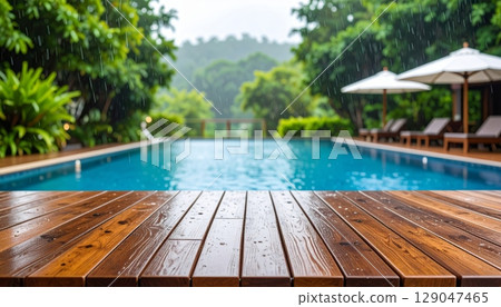 Tropical luxury resort swimming pool with clear blue water, palm trees, and a serene sky, perfect for a relaxing summer vacation Tropical luxury resort swimming pool with clear blue water, palm trees, and a serene sky, perfect for a relaxing summer vacation 129047465