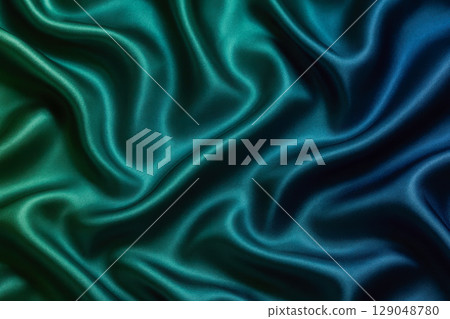 Luxury silk fabric texture background with blue and green gradient. Elegant smooth satin textile with folds for abstract design 129048780