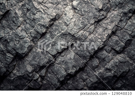 Gray stone background with layered texture, rugged rock surface, detailed geology, natural construction material, cracked pattern, earth mineral template 129048810