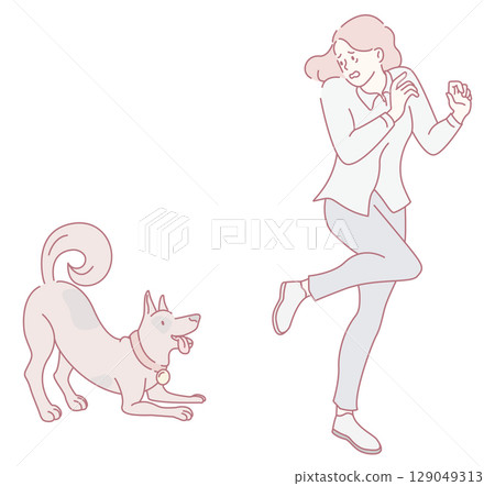 A playful dog and a joyful woman are enjoying a funfilled day together outdoors in the sunshine 129049313