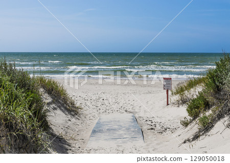 Sandy Footpath Through Dunes to Baltic Sea Beach with Rolling Waves 129050018