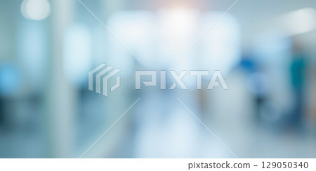 Abstract blur of hospital corridor or clinic interior, bright medical background with light flare for healthcare and science concepts Abstract blur of hospital corridor or clinic interior, bright medical background with light flare for healthcare and science concepts 129050340