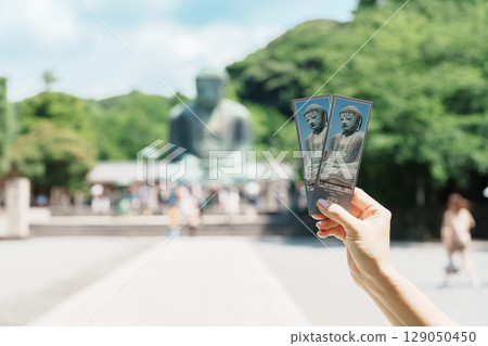 tourist show ticket and Visiting in Kamakura, Kanagawa, Japan. Traveler sightseeing the Great Buddha statue. Landmark and popular for tourists attraction near Tokyo. Kanakawa, Japan, 13 July 2025 tourist show ticket and Visiting in Kamakura, Kanagawa, Japan. Traveler sightseeing the Great Buddha statue. Landmark and popular for tourists attraction near Tokyo. Kanakawa, Japan, 13 July 2025 129050450