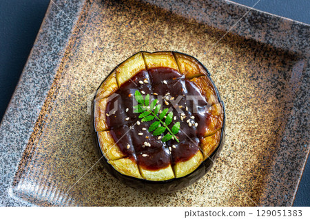 Eggplant with miso sauce and kinome leaf buds Eggplant with miso sauce and kinome leaf buds 129051383