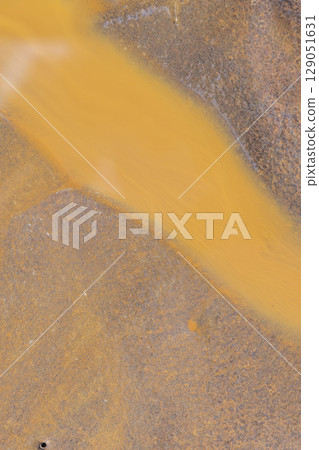 rusty metal made of alloy of metals, the details of a part of a metal alloy structure covered with red rust spots rusty metal made of alloy of metals, the details of a part of a metal alloy structure covered with red rust spots 129051631