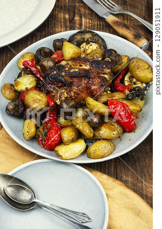 Roast pork with different vegetables. Roast pork with different vegetables. 129051911
