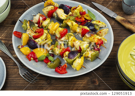 Fish skewers on a BBQ. Fish skewers on a BBQ. 129051913