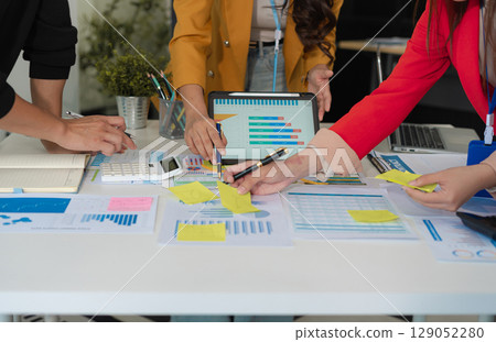 Project manager working and update tasks with milestones progress planning and professional investor working new start up project in the office. Project manager working and update tasks with milestones progress planning and professional investor working new start up project in the office. 129052280