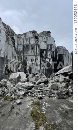 Boy Exploring an Abandoned Marble Quarry 129052468