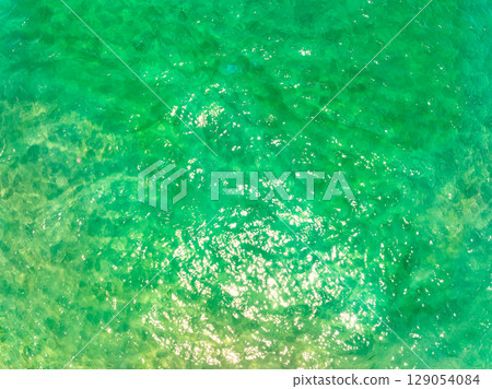 Beautiful sea surface in summer season Drone top view nature ocean background Beautiful sea surface in summer season Drone top view nature ocean background 129054084