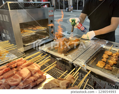 Korean street food staple | Grilled pork skewers Korean street food staple | Grilled pork skewers 129054993