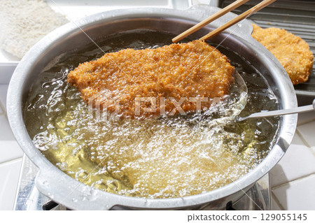 Pork cutlet preparation scene 129055145