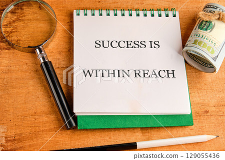 Business professionals concept. Words SUCCESS IS WITHIN REACH Business professionals concept. Words SUCCESS IS WITHIN REACH 129055436
