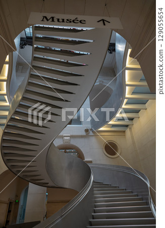 Monumental staircase meanders within National library of france (BnF). Monumental staircase meanders within National library of france (BnF). 129055654