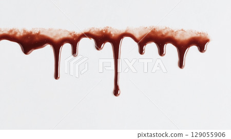 Chocolate drip splash on white background 129055906