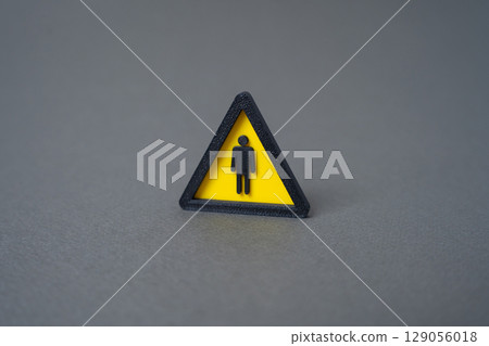 Warning sign with a person. Concept of searching for workers and new employees. Labor shortage issue. Skill gap. Urgent recruitment. Employment opportunity. 129056018