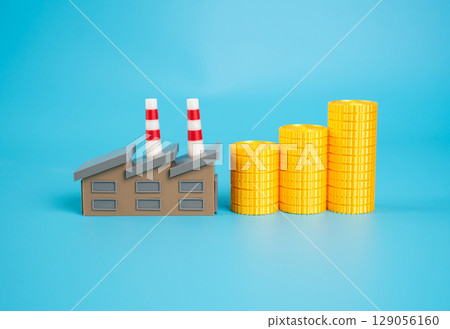 Industrial plant and growing stack of coins. Enterprise income. Payment of taxes. Industrial profitability and contribution to national budgets. Economic development. Tax from successful enterprises. 129056160
