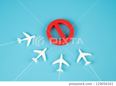 Passenger planes approach the no-fly zone. Geopolitical conflict. Restricted airspace. Air traffic disruptions and aviation route constraints. Passenger planes approach the no-fly zone. Geopolitical conflict. Restricted airspace. Air traffic disruptions and aviation route constraints. 129056161