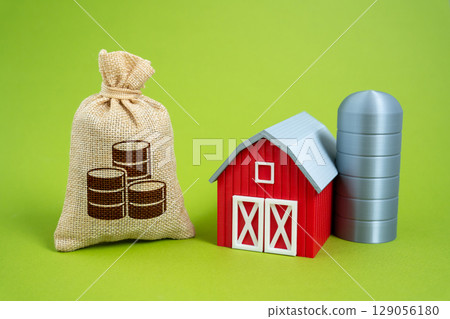 Farm and money bag. Investments. Buying and selling. Profit from farming. Rural entrepreneurship, returns on agribusiness investment. Food market profitability. Financial integration of farms. 129056180