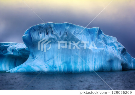 Iceberg fanciful shapes, blue fresh ice Iceberg fanciful shapes, blue fresh ice 129056269