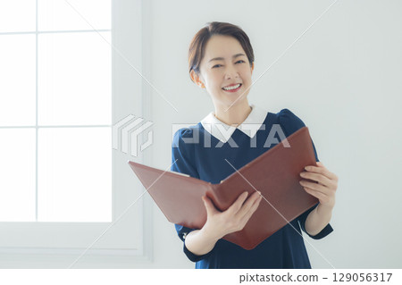 Portrait of a middle-aged woman 129056317