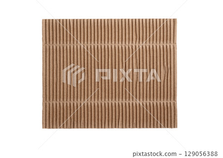 Corrugated brown packaging cardboard isolated on white background. Aged used piece of paper 129056388