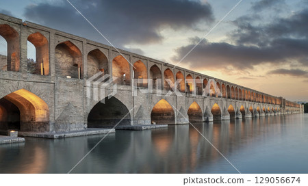 Si-o-se-pol Allahverdi Khan Bridge is a stunning Safavid era stone arch bridge during sunset. Long exposure shot blurring is done on purpose 129056674