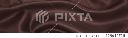 Smooth elegant dark brown silk or satin luxury cloth texture as abstract background. Luxurious background design. In Sepia toned. Retro style Smooth elegant dark brown silk or satin luxury cloth texture as abstract background. Luxurious background design. In Sepia toned. Retro style 129056726
