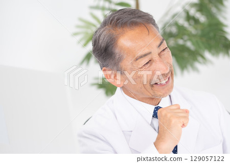 Medical image: A man in a white coat Medical image: A man in a white coat 129057122