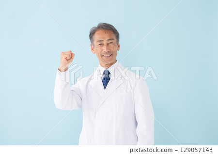 Medical image: Man in white coat, blue background 129057143