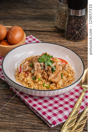 The Fried rice with pork for Thai food and cooking concept The Fried rice with pork for Thai food and cooking concept 129057310