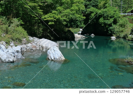 Emerald green Asemi River in summer (Motoyama Town, Kochi Prefecture) 129057746