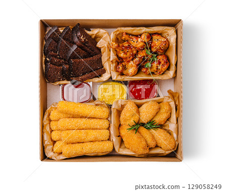 Enjoying a variety of tasty appetizers for a casual gathering Enjoying a variety of tasty appetizers for a casual gathering 129058249