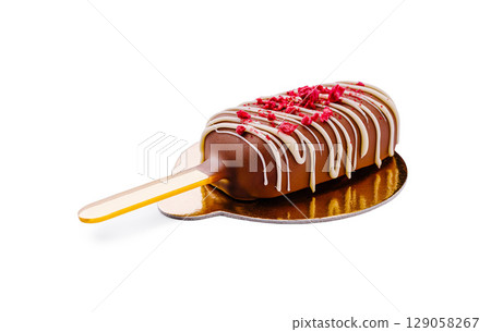 Delicious ice cream bar with chocolate coating and decorative toppings Delicious ice cream bar with chocolate coating and decorative toppings 129058267