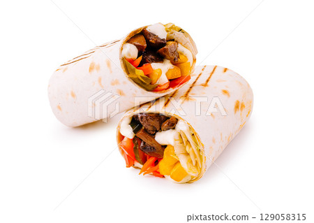 Delicious wraps filled with grilled vegetables and meats ready to eat Delicious wraps filled with grilled vegetables and meats ready to eat 129058315