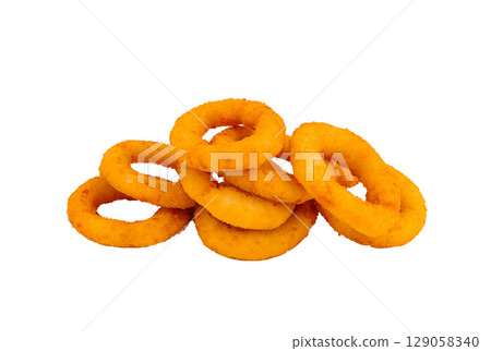 Crunchy onion rings stacked on a white background ready to serve Crunchy onion rings stacked on a white background ready to serve 129058340