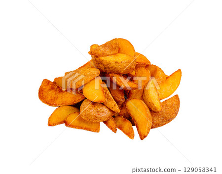 Crispy golden potato wedges piled high on a white background Crispy golden potato wedges piled high on a white background 129058341