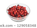 Fresh cranberries in a glass bowl on a white background 129058348