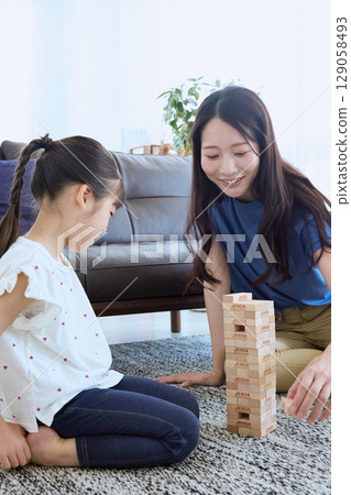Mother-daughter interaction and indoor educational games 129058493