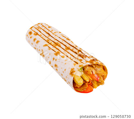 Delicious chicken wrap with fresh vegetables and sauces on a grill Delicious chicken wrap with fresh vegetables and sauces on a grill 129058730