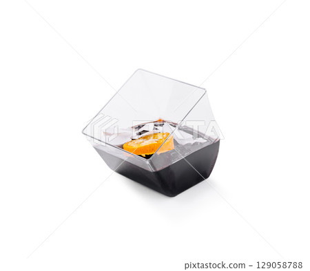 Elegant cocktail served in modern glass with ice and orange slice 129058788