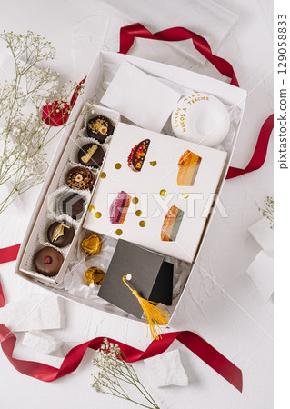 Delightful dessert gift box filled with sweets for a special occasion 129058833