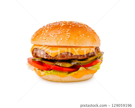 Delicious cheeseburger with fresh vegetables and sesame seed bun served hot 129059196