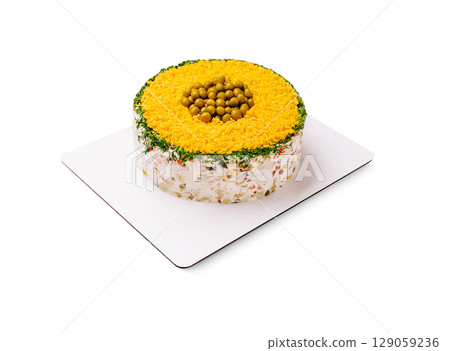 Colorful vegetarian cake with layers of vegetables and yellow topping 129059236