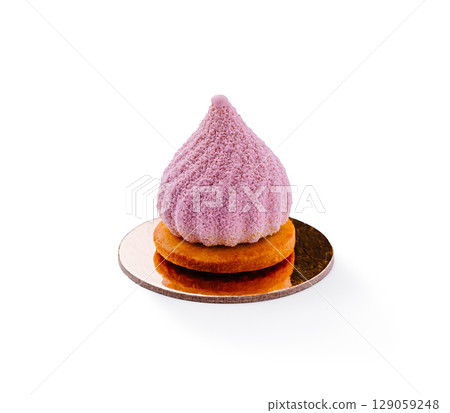 Sweet purple dessert with textured topping on a golden base 129059248