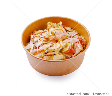 Delicious snack bowl with savory ingredients and spices at a local food market Delicious snack bowl with savory ingredients and spices at a local food market 129059442