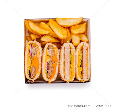 Delicious fast food meal featuring flavorful sandwiches and golden fries 129059447