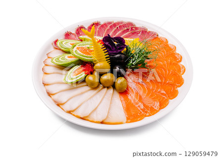 Vibrant sashimi platter with salmon, tuna, and elegant garnishes Vibrant sashimi platter with salmon, tuna, and elegant garnishes 129059479