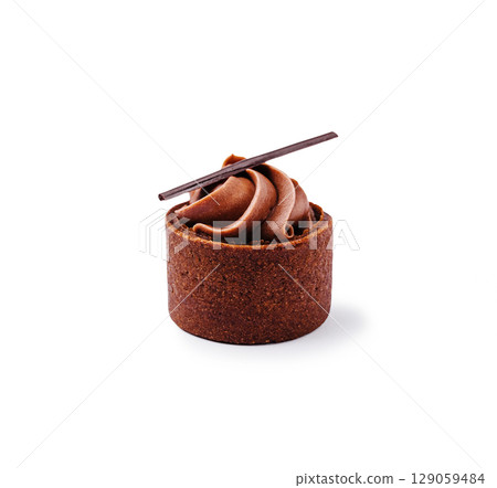 Delicious chocolate dessert served elegantly in a small pastry shell 129059484