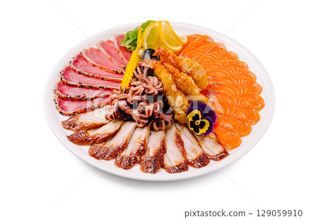Elegant seafood platter with salmon, eel fish, tuna, shrimp, and baby octopus Elegant seafood platter with salmon, eel fish, tuna, shrimp, and baby octopus 129059910